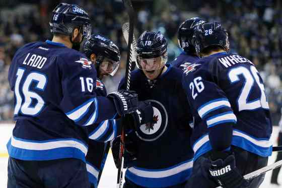 JOHN WOODS / THE CANADIAN PRESSWinnipeg Jets' Andrew Ladd (16), Mathieu Perreault (85), Bryan Little (18), Dustin Byfuglien (33) and Blake Wheeler (26) celebrate Little's goal against the Nashville Predators during second period on Thursday.