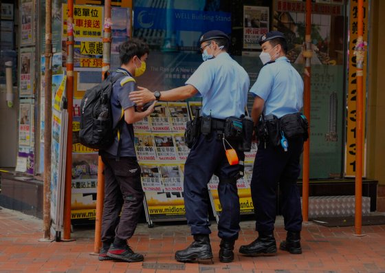 CPPolice officers outside Hong Kong’s Victoria Park, where people have gathered for vigils in past years to mark the anniversary of the Tiananmen Square crackdown. (Vincent Yu / The Associated Press)