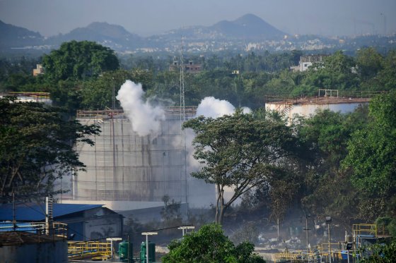 The Associated PressSmoke rises from LG Polymers plant, the site of a chemical gas leakage, in Vishakhapatnam, India, Thursday. Synthetic chemical styrene leaked from the industrial plant, leaving people struggling to breathe and collapsing in the streets as they tried to flee.