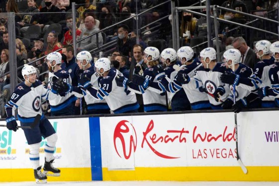 Jets centre Kristian Reichel is congratulated after scoring a goal against the Golden Knights. (Ellen Schmidt / The Associated Press)