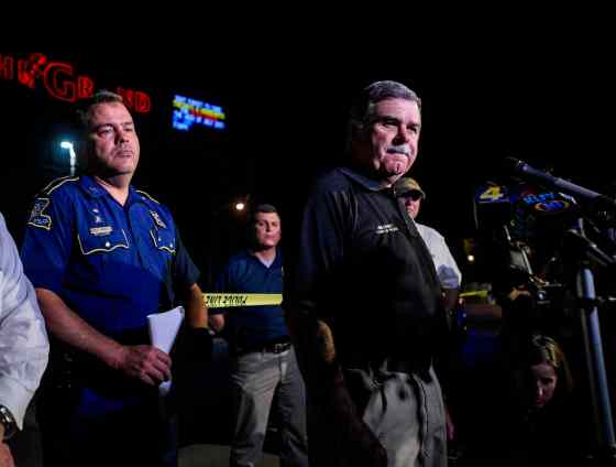 Paul Kieu / The Daily Advertiser via The Associated PressLafayette Police Chief Jim Craft addresses the media early Friday after a deadly shooting at the Grand Theatre from the night before.