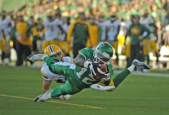 MARK TAYLOR / THE CANADIAN PRESSSaskatchewan Roughriders wide receiver Armanti Edwards (12) dives for a late game touchdown during CFL action against the Edmonton Eskimos in Regina on Sunday.