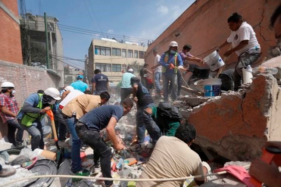 Miguel Tovar / The Associated PressRescue workers and volunteers search for survivors at the Ninos Heroes neighborhood in Mexico City, Tuesday.