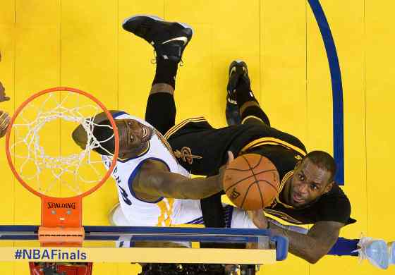 JOHN G. MABLANGO / THE ASSOCIATED PRESSCleveland Cavaliers forward LeBron James, right, shoots against Golden State Warriors forward Draymond Green during the second half of Game 7 of basketball's NBA Finals in Oakland, Calif., Sunday, June 19, 2016. The Cavaliers won 93-89.