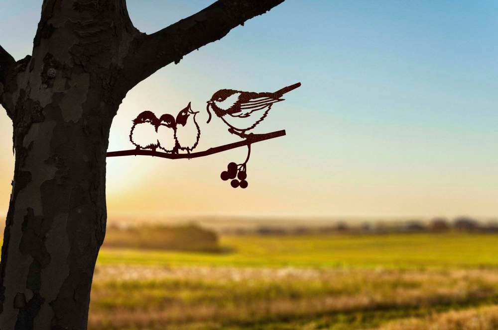 A tree is a perfect spot for this Metalbird Chickadee family. Simply tap, tap, tap it in with your hammer.