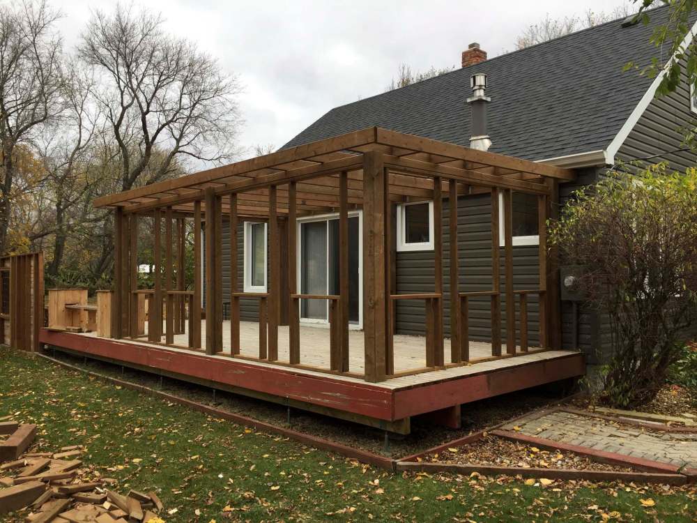 Marc LaBossiere / winnipeg free press
The pergola framework ended up being adapted to become a sunroom, with walls framed between the posts. Plywood was affixed to the framework of the wall panels between each post and eight slider windows were installed.