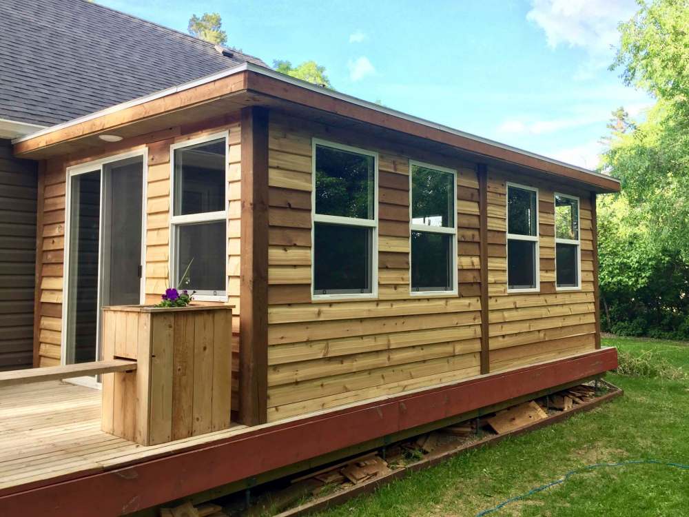 Harold Eide
A problem with a slanting deck turned into a much bigger project. At first the homeowner wanted a pergola put on the deck; that evolved into a covered sunroom.
