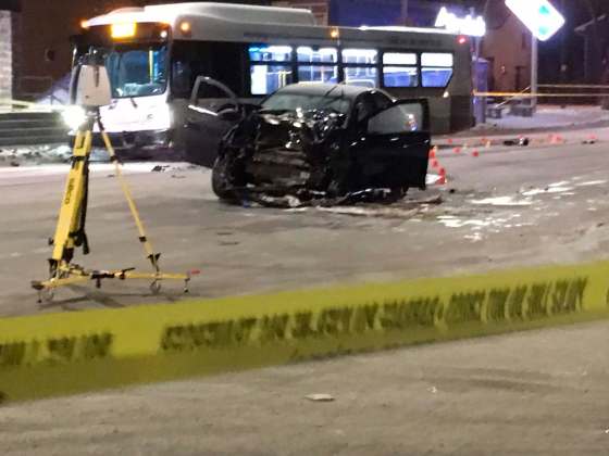 Bill Redekop / WINNIPEG FREE PRESSPolice tape and a smashed vehicle are seen at the site of the auto collision on Osborne Street Friday morning.