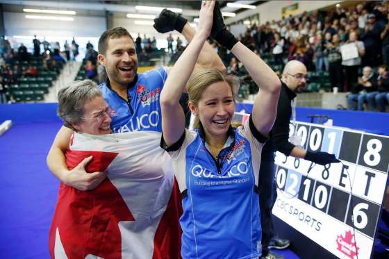 JOHN WOODS / WINNIPEG FREE PRESSKaitlyn Lawes with her mother Cheryl and John Morris celebrate defeating Brad Gushue and Val Sweeting in the Mixed Doubles Curling Trials in Portage La Prairie.