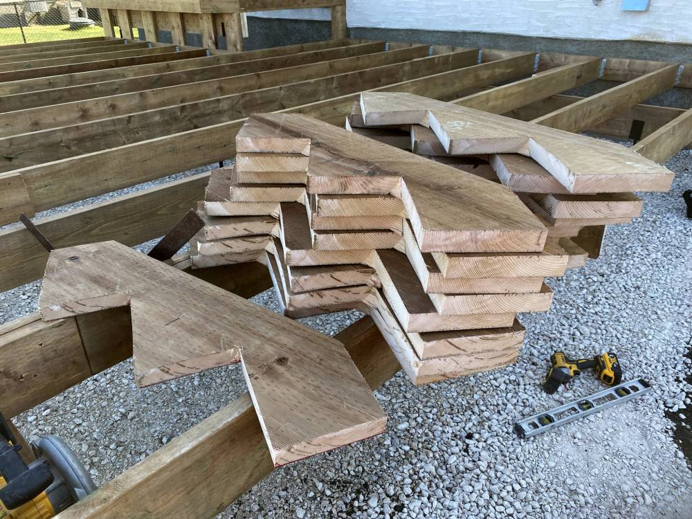 Once the template is created, the subsequent stringers are traced and cut using a circular saw.