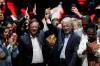 Fernando Vergara/AP Photo
Former rebel Gustavo Petro, left, celebrates with former Bogota Mayor Antanas Mockus after winning a runoff presidential election in Colombia on June 19.