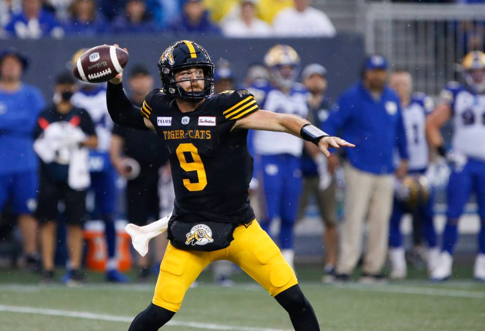THE CANADIAN PRESS/John Woods
The Bombers defence forced Hamilton Tiger-Cats quarterback Dane Evans (9) to throw two interceptions.