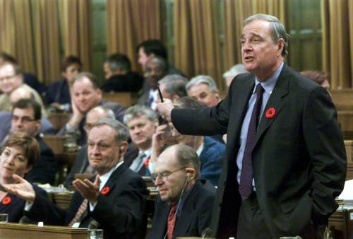 Tom Hanson / The Canadian Press files
As finance minister, Paul Martin (right) was an influential member of then-prime minister Jean Chrétien’s cabinet, in a time before power became increasingly centralized at the top.