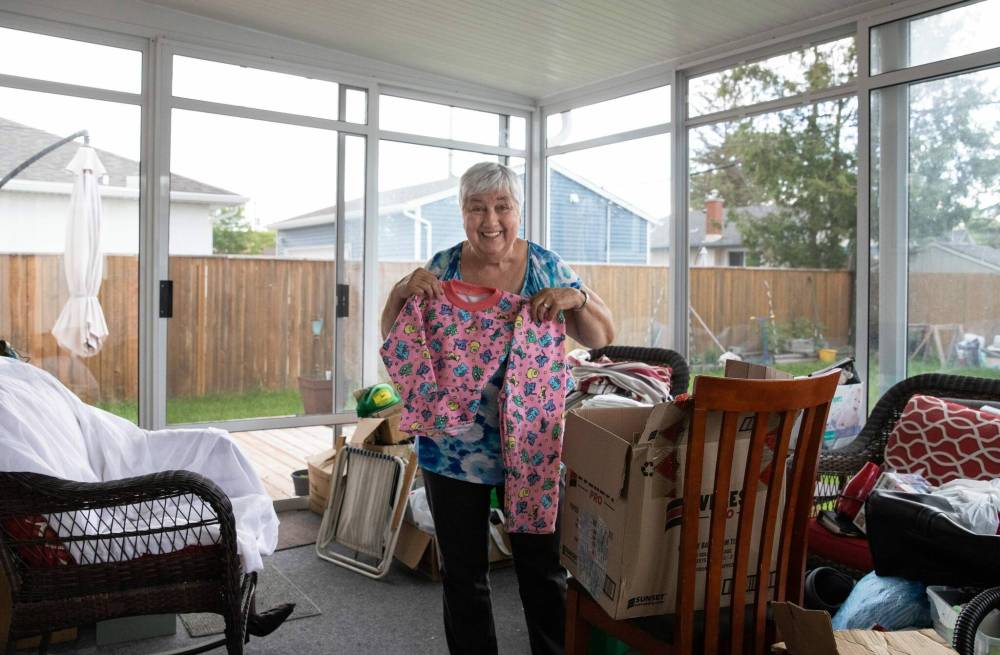 JESSICA LEE / WINNIPEG FREE PRESS
Elsie Edwards at her home filled with donations. People who drop by Edwards’ home are often reluctant to ask for help. She never means-tests; she simply opens her garage door.