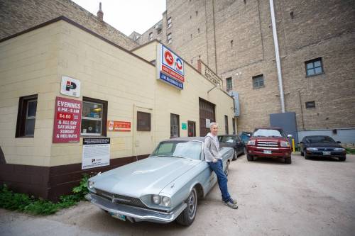 MIKE DEAL / WINNIPEG FREE PRESS
Andy Baranowski, owner of J.W. McDonald Auto Service, by one of his cars, a 66 Thunderbird Landau.