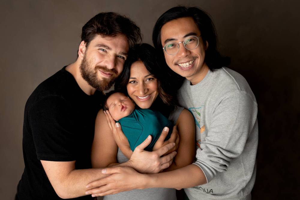 SUNNY S-H PHOTOGRAPHY
From left, Mat Arye, Anroup Patti (holding baby August) and Jeremy Tse met and built a family through an incredible surrogacy journey.