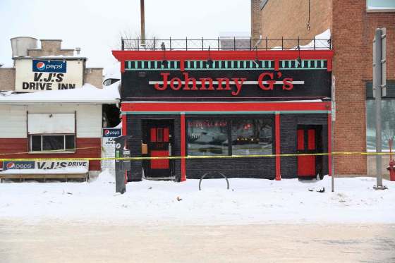 Mike Deal / Winnipeg Free PressLate Thursday morning Winnipeg police were still at Johnny G's investigating the deaths of two men.