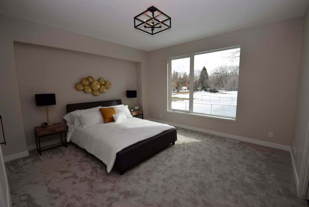 Each of the three bedrooms on the home’s main level are spacious.
