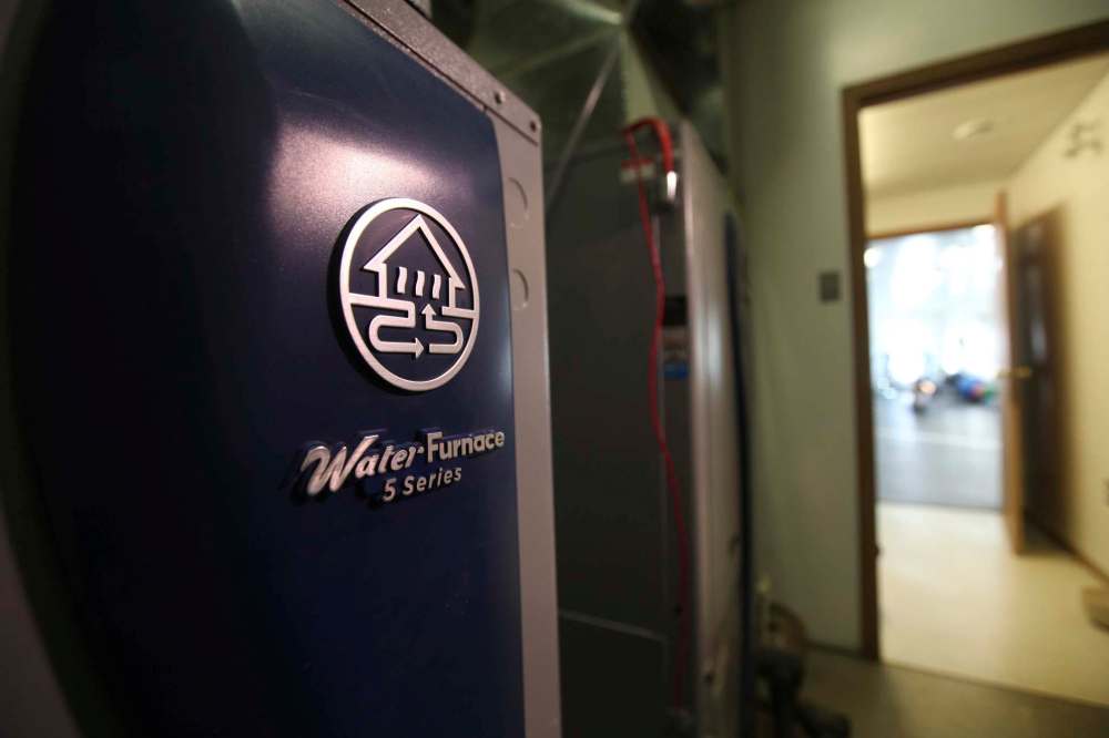 Energy efficient upgrades include installation of a high-efficiency furnace, increased insulation in the attic and basement and replacement of older windows and doors, which improve the airtightness of the building enclosure, reducing warm-air loss to the exterior. The downside is excess moisture in the house air, which now stays inside. (Ruth Bonneville / Winnipeg Free Press files)