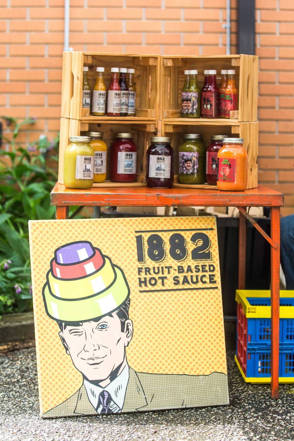 MIKAELA MACKENZIE / WINNIPEG FREE PRESS
Sweet heat: A display of 1882 Fruit-Based Hot Sauce at the Wolseley Farmers Market.