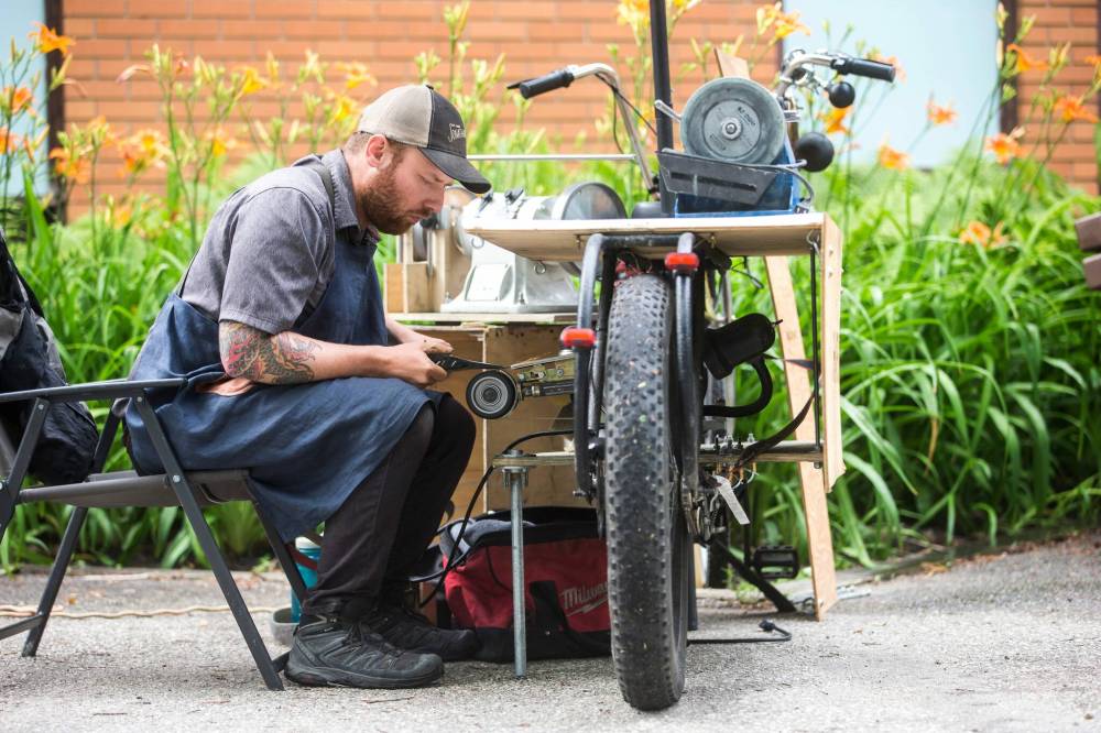 MIKAELA MACKENZIE / WINNIPEG FREE PRESS
Bret Gordon, owner of Wood Forge Sharpening, has an axe to grind.