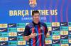 Robert Lewandowski models his new FC Barcelona soccer jersey after signing with the Catalan giants. (Marta Lavandier / The Associated Press)