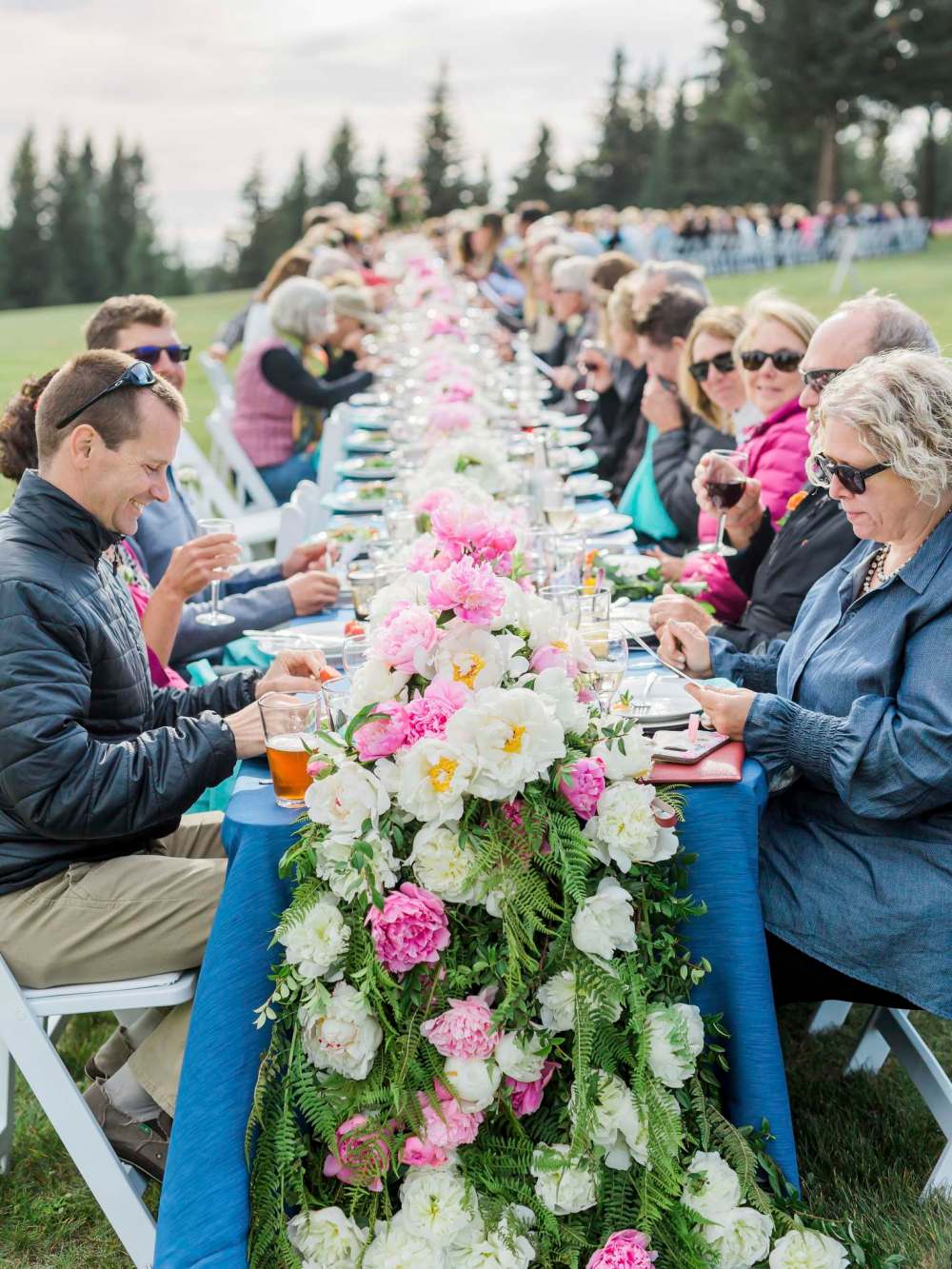 Forefront: Canadians Miles Hunter, Hunters Garden Centre & Flower Shop, (left) and Gloria Sawatzky, Beyond Flowers (opposite) participates at the 2019 American Grown Field to Vase dinner on August 3rd at Joslyn Peonies farm in Homer, Alaska
Certified American Grown / Rachel Tweggs Photography