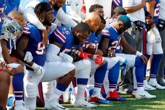 Jeffrey T. Barnes / The Associated PressBuffalo Bills players kneel during the national anthem prior to an NFL football game against the Denver Broncos, Sunday, in Orchard Park, N.Y.