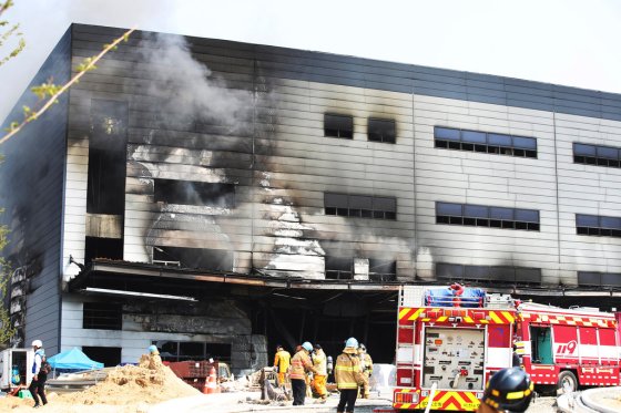 Hong Ki-won / Yonhap / The Associated PressSmoke rises from a construction site in Icheon, South Korea on Wednesday. Several workers were killed in the fire, South Korean officials said.