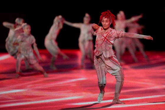 CPDancers perform during the opening ceremony. (Natacha Pisarenko / The Associated Press)