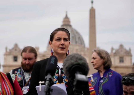 CPMétis National Council president Cassidy Caron  speaks to the media in St. Peter's Square after their meeting with Pope Francis. (Gregorio Borgia / The Associated Press)
