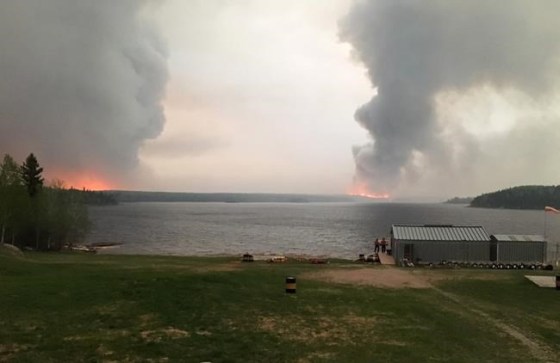THE CANADIAN PRESS / Government of ManitobaFires burn in Little Grand Rapids.