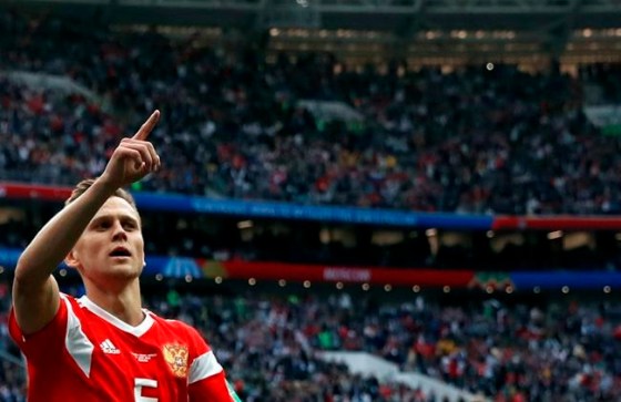 Pavel Golovkin / The Associated PressRussia's Denis Cheryshev celebrates after scoring his side's fourth goal during the group A match between Russia and Saudi Arabia.