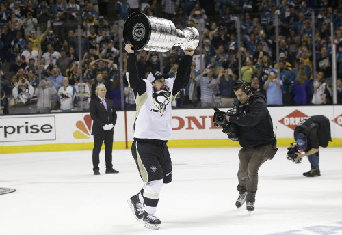 Marcio Jose Sanchez / The Associated PressPittsburgh Penguins center Sidney Crosby celebrates with the Stanley Cup after Game 6 of the NHL hockey Stanley Cup Finals against the San Jose Sharks in San Jose, Calif., Sunday. The Penguins won 3-1 to win the series 4-2.