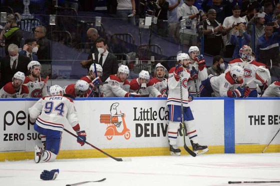 The Montreal Canadiens watch as the Tampa Bay Lightning celebrate winning the Stanley Cup on July 7. (Phelan Ebenhack / The Associated Press files)