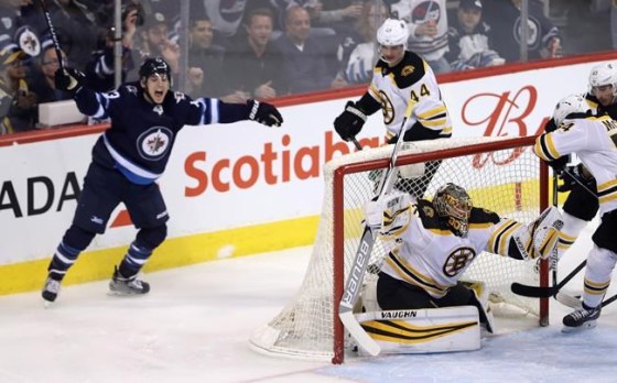 Trevor Hagan / THE CANADIAN PRESSWinnipeg Jets' Brandon Tanev (13) celebrates after scoring on the Boston Bruins.