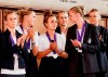 Germany players Svenja Huth, Laura Freigang, Lina Magull, Merle Frohms, Alexandra Popp and Lena Lattwein, from left, attend a reception in the Roemer town hall, upon the team's return from the Women's Euro 2022 soccer, after losing to England in Sunday's final, in Frankfurt, Monday, Aug. 1, 2022. (Uwe Anspach /dpa via AP)