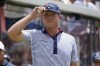 Talor Gooch acknowledges the crowd before hitting off the first tee during the final round of the Bedminster Invitational LIV Golf tournament in Bedminster, N.J., Sunday, July 31, 2022. (AP Photo/Seth Wenig)