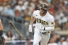 San Diego Padres' Brandon Drury throws his bat after flying out against the San Francisco Giants during the second inning of a baseball game Monday, Aug. 8, 2022, in San Diego. (AP Photo/Mike McGinnis)