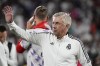 Real Madrid manager Carlo Ancelotti waves to fans after the team's friendly soccer match against Juventus o Saturday, July 30, 2022, in Pasadena, Calif. (AP Photo/Marcio Jose Sanchez)