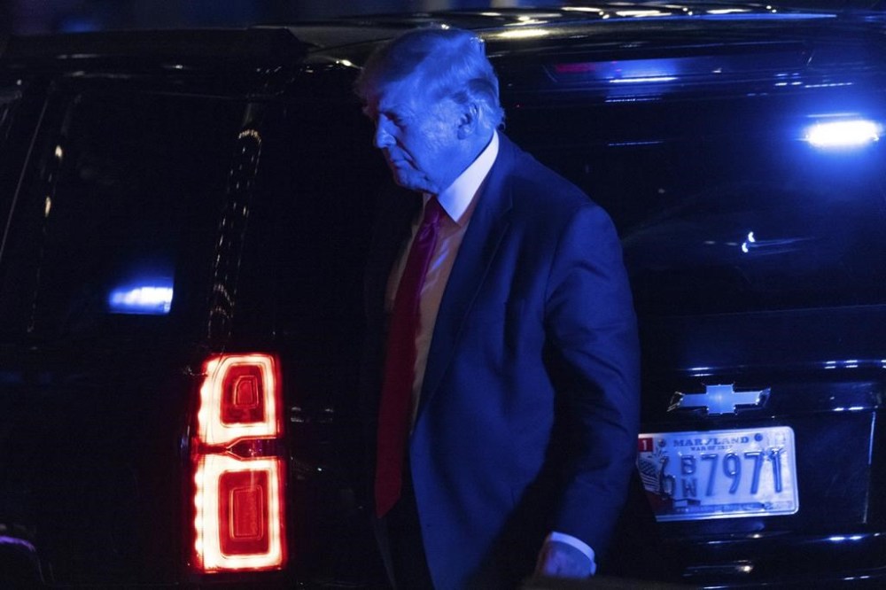 Former President Donald Trump arrives at Trump Tower, late Tuesday, Aug. 9, 2022, in New York. (AP Photo/Yuki Iwamura)