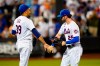 New York Mets relief pitcher Edwin Diaz (39) celebrates with Tyler Naquin (25) after the team's 6-4 win in a baseball game against the Atlanta Braves on Thursday, Aug. 4, 2022, in New York. (AP Photo/Frank Franklin II)