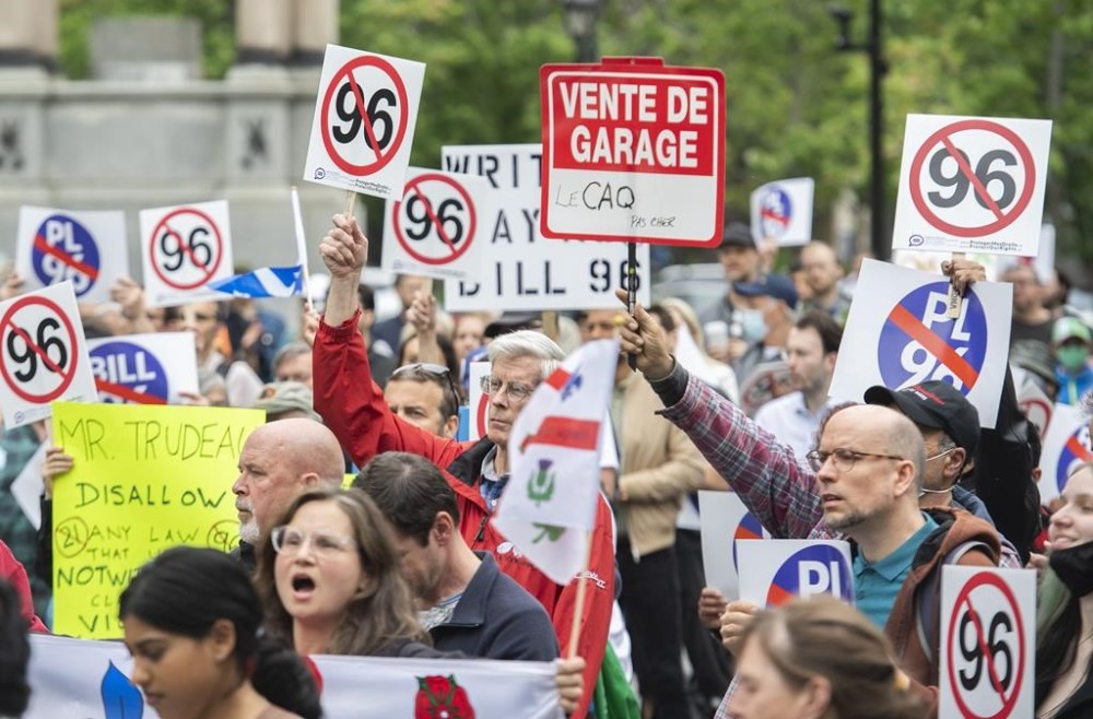 Judge suspends two articles of Quebec’s new language law, citing access