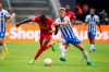 Frankfurt's Randal Kolo Muani, left, and Berlin's Maximilian Mittelstaedt, right, fight for the ballduring the Bundesliga soccer match between Hertha BSC Berlin and Eintracht Frankfurt in Berlin, Germany, Saturday, Aug. 13, 2022. (Christophe Gateau/dpa via AP)