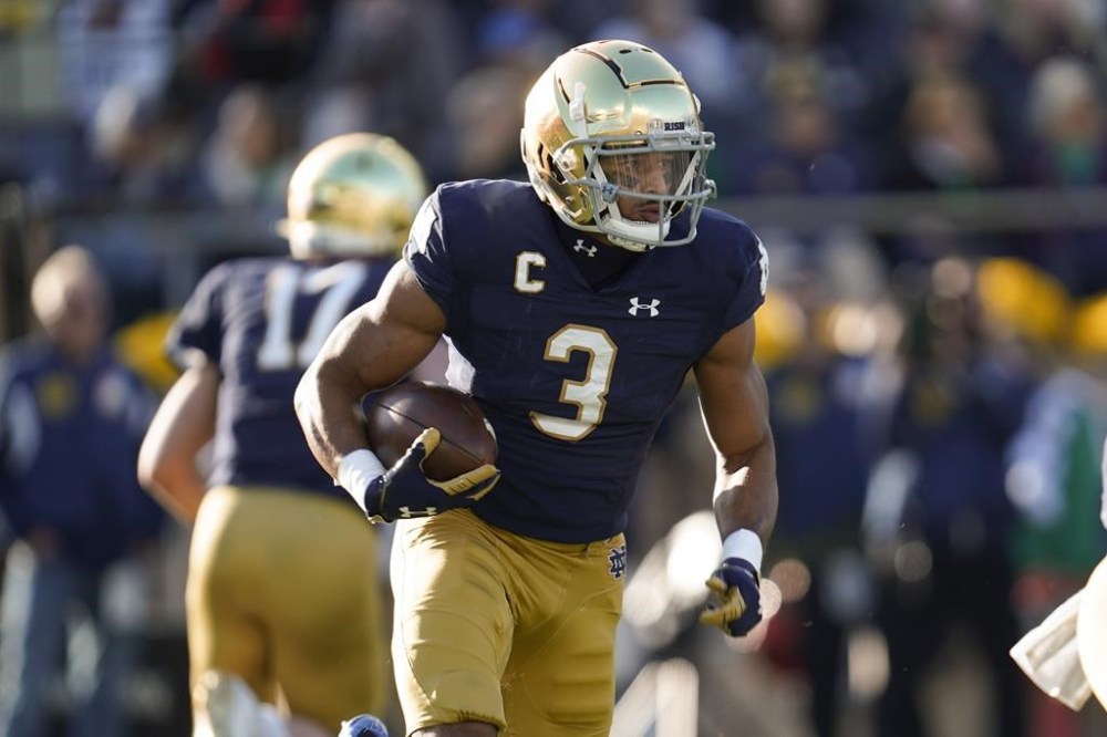 FILE - Notre Dame wide receiver Avery Davis (3) runs against Navy in the first half of an NCAA college football game in South Bend, Ind., Saturday, Nov. 6, 2021. Davis will miss the season after tearing a ligament in his right knee. Notre Dame also announced Saturday, Aug. 13, 2022, sophomore quarterback Tyler Buchner will start the opener against Ohio State on Sept. 3. (AP Photo/Paul Sancya, File)