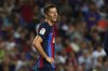 Barcelona's Robert Lewandowski reacts during a Spanish La Liga soccer match between Barcelona and Rayo Vallecano at the Camp Nou stadium in Barcelona, Spain, Saturday, Aug. 13, 2022. (AP Photo/Joan Monfort)