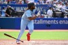 Toronto Blue Jays' Vladimir Guerrero Jr. runs out a ground rule double off Cleveland Guardians starting pitcher Triston McKenzie in first inning American League baseball action in Toronto on Saturday, August 13, 2022. THE CANADIAN PRESS/Jon Blacker