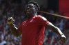 Nottingham Forest's Taiwo Awoniyi celebrates after scoring against West Ham during the English Premier League soccer match between Nottingham Forest and West Ham United at the City ground in Nottingham, England, Sunday, Aug. 14, 2022. (AP Photo/Rui Vieira)