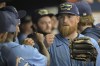 Tampa Bay Rays starter Drew Rasmussen, right, three outs from a perfect baseball game, greets teammates in the dugout after he left during the ninth inning against the Baltimore Orioles, Sunday, Aug. 14, 2022, in St. Petersburg, Fla. (AP Photo/Steve Nesius)