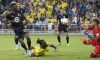 Minnesota United goalkeeper Dayne St. Clair (97) defends the goal as Nashville SC forward C.J. Sapong (17) attacks past Minnesota United defender Bakaye Dibassy (12) during the first half of an MLS soccer match at Geodis Park, Sunday, Aug. 14, 2022, in Nashville, Tenn. (George Walker IV/The Tennessean via AP)